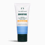 Tube of The Body Shop Skin Defence Hydrating Hand & Body Protector on a white background
