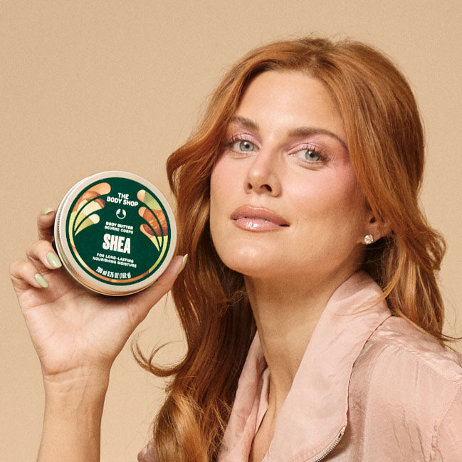 Ashley James holding The Body Shop Shea Body Butter
